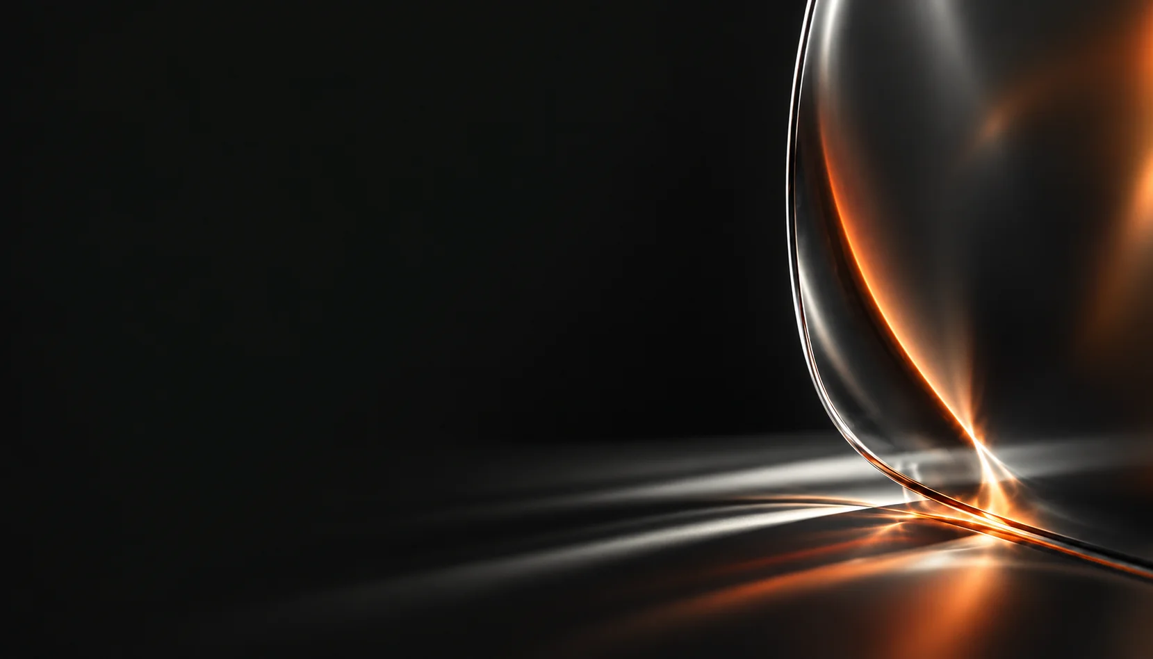Smoked folded glass outlined with silver and amber light on charcoal